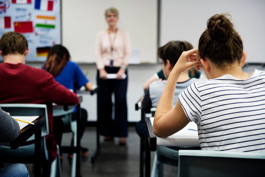 Students doing the exam in classroom