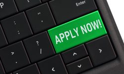 Computer keyboard with an APPLY NOW key - applying online, job employment, application, loan, school