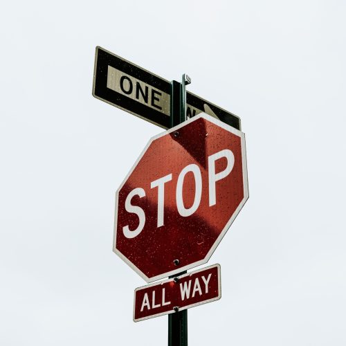 Red stop sign in downtown